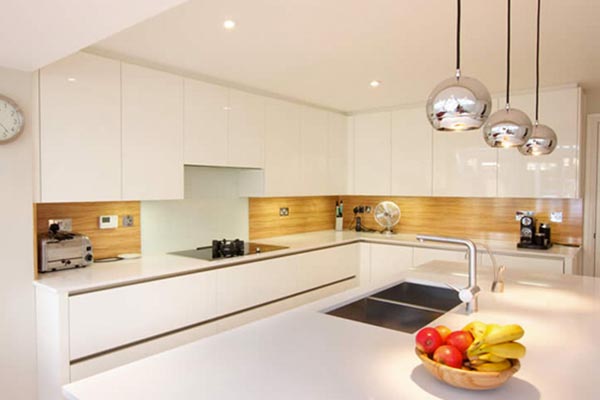 White clean kitchen with glossy surfaces